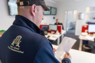 confern employee holds working papers